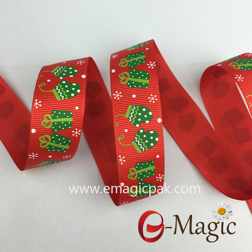 christmas print on red ribbon